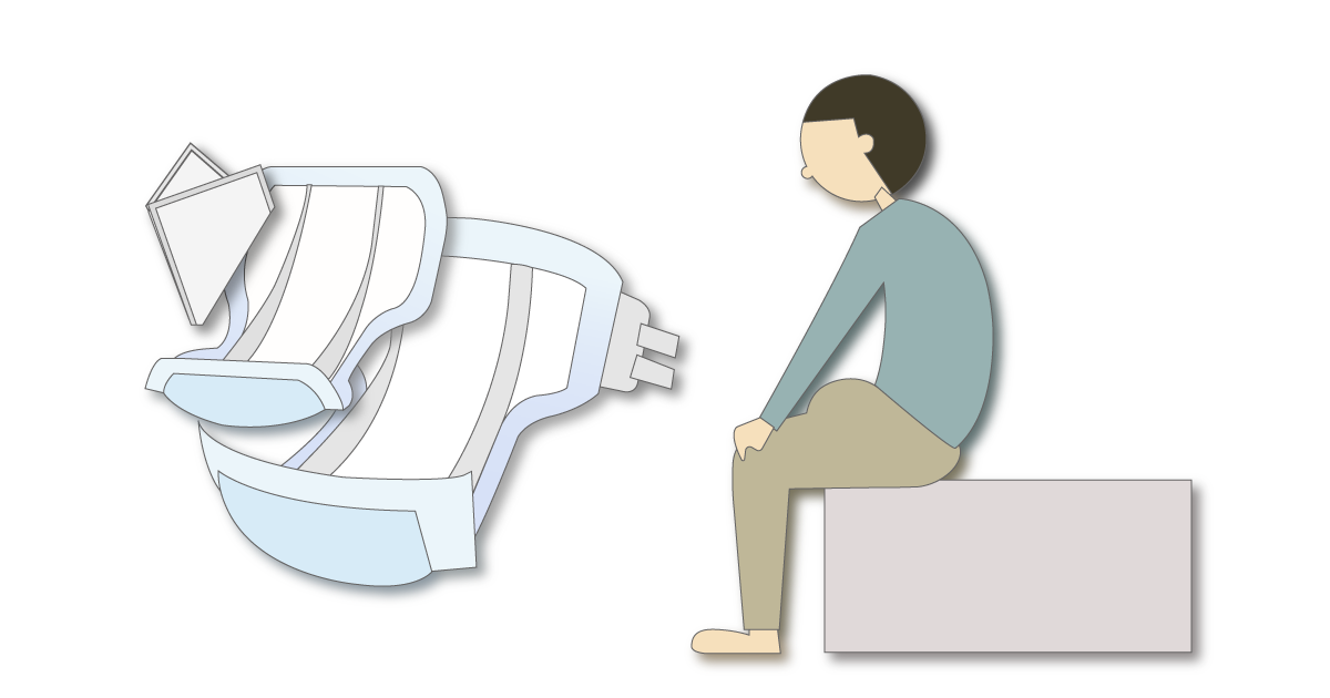 テープ型おむつと男性用パッドを重ねると前側に厚みが出るイラスト